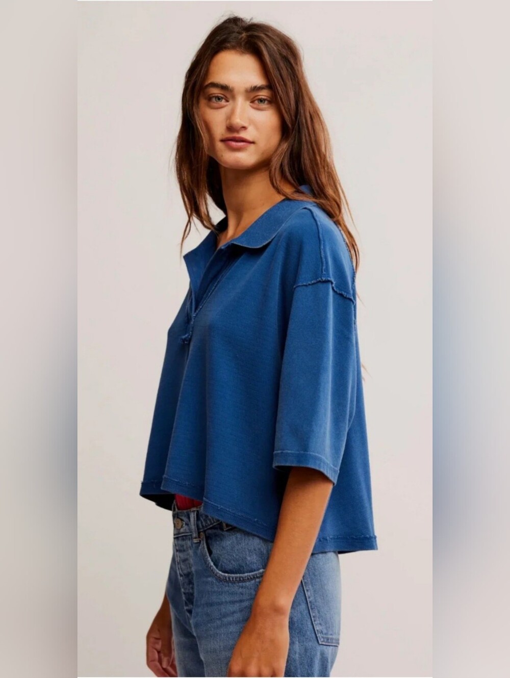 NWT..We the  Free People Denmark Polo is in the shade Bellweather Blue Med